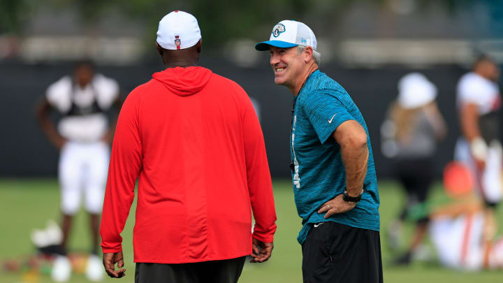 Jacksonville Jaguars head coach Doug Pederson laughs with Tampa Bay Buccaneers head coach Todd Bowles during a combined NFL football training camp session between the Tampa Bay Buccaneers and Jacksonville Jaguars Wednesday, Aug. 14, 2024 at EverBank Stadium’s Miller Electric Center in Jacksonville, Fla. [Corey Perrine/Florida Times-Union]