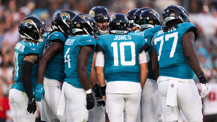 Aug 17, 2024; Jacksonville, Florida, USA; Jacksonville Jaguars quarterback Mac Jones (10) leads a huddle against the Tampa Bay Buccaneers in the first quarter during a preseason game at EverBank Stadium. Mandatory Credit: Nathan Ray Seebeck-USA TODAY Sports