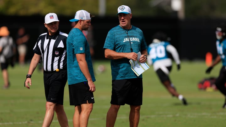 Jacksonville Jaguars head coach Doug Pederson, center, and offensive coordinator Press Taylor talk during a combined NFL football training camp session between the Tampa Bay Buccaneers and Jacksonville Jaguars Thursday, Aug. 15, 2024 at EverBank Stadium’s Miller Electric Center in Jacksonville, Fla. [Corey Perrine/Florida Times-Union]