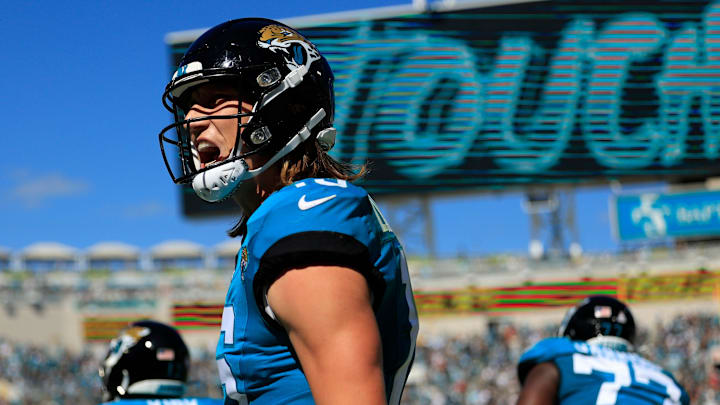 Jacksonville Jaguars quarterback Trevor Lawrence (16) celebrates his pass for a touchdown score to wide receiver Christian Kirk (13) during the second quarter of an NFL football matchup Sunday, Oct. 15, 2023 at EverBank Stadium in Jacksonville, Fla. The Jacksonville Jaguars defeated the Indianapolis Colts 37-20. [Corey Perrine/Florida Times-Union]