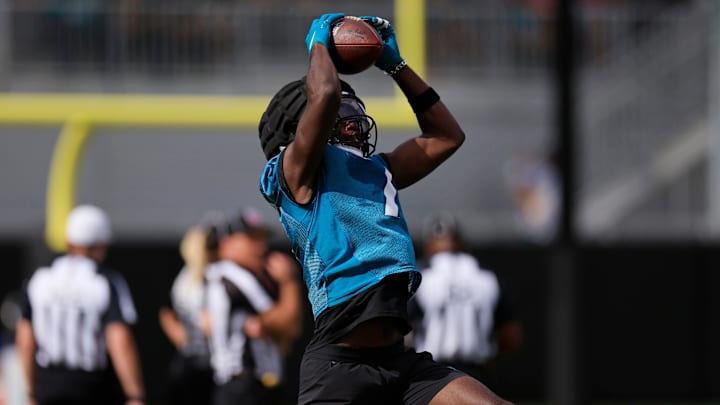 Jacksonville Jaguars wide receiver Brian Thomas Jr. (7) hauls in a reception during a combined NFL football training camp session between the Tampa Bay Buccaneers and Jacksonville Jaguars Thursday, Aug. 15, 2024 at EverBank Stadium’s Miller Electric Center in Jacksonville, Fla. [Corey Perrine/Florida Times-Union]