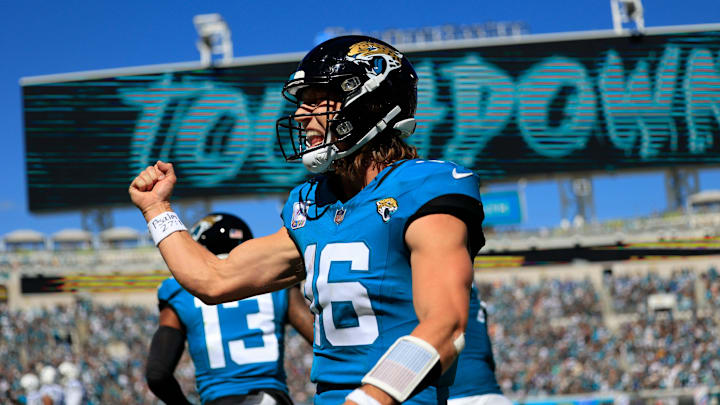 Jacksonville Jaguars quarterback Trevor Lawrence (16) celebrates his pass for a touchdown score to wide receiver Christian Kirk (13) during the second quarter of an NFL football matchup Sunday, Oct. 15, 2023 at EverBank Stadium in Jacksonville, Fla. The Jacksonville Jaguars defeated the Indianapolis Colts 37-20. [Corey Perrine/Florida Times-Union]