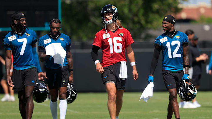 From left, Jacksonville Jaguars wide receiver Brian Thomas Jr. (7), wide receiver Dyami Brown (5), quarterback Trevor Lawrence (16) and wide receiver Travis Hunter (12) walks off the field during the 10th organized team activity at Miller Electric Center Wednesday, June 4, 2025 in Jacksonville, Fla. [Corey Perrine/Florida Times-Union]