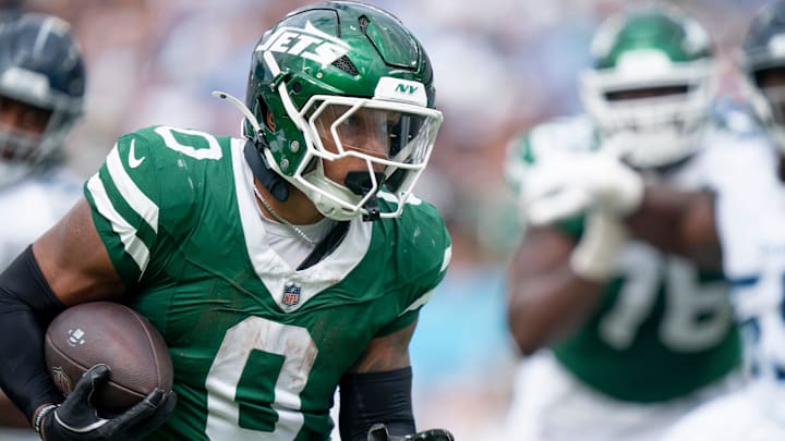 New York Jets running back Braelon Allen (0) runs for a touchdown against the Tennessee Titans during their game at Nissan Stadium in Nashville, Tenn., Sunday, Sept. 15, 2024.