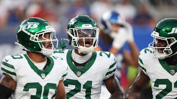 Aug 16, 2025; East Rutherford, New Jersey, USA; New York Jets cornerback Brandon Stephens (21) celebrates a defensive stop with safety Tony Adams (22) and cornerback Michael Carter II (30) during the first half against the New York Giants at MetLife Stadium. Mandatory Credit: Vincent Carchietta-Imagn Images Aug 16, 2025; East Rutherford, New Jersey, USA; New York Jets cornerback Brandon Stephens (21) celebrates a defensive stop with safety Tony Adams (22) and cornerback Michael Carter II (30) during the first half against the New York Giants at MetLife Stadium. Mandatory Credit: Vincent Carchietta-Imagn Images