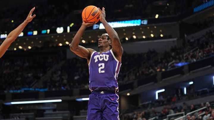 Mar 22, 2024; Indianapolis, IN, USA; TCU Horned Frogs forward Emanuel Miller (2) takes a shot at the basket during the first half against the Utah State Aggies in the first round of the 2024 NCAA Tournament at Gainbridge FieldHouse. Mandatory Credit: Robert Goddin-USA TODAY Sports