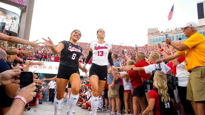 Aug 30, 2023; Lincoln, NE, USA; The Nebraska Cornhuskers run out of the tunnel before the match against the Omaha Mavericks at Memorial Stadium. Mandatory Credit: Dylan Widger-USA TODAY Sports