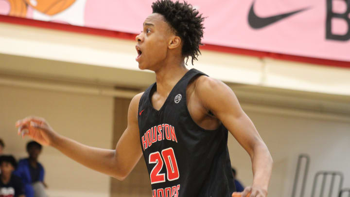 Tre Johnson (20 reacts to a play during an AAU basketball game July 4, 2023, at the Nike EYBL Peach Jam in North Augusta, S.C. A Kentucky target, Johnson is considered one of the shooting guards in the Class of 2024.