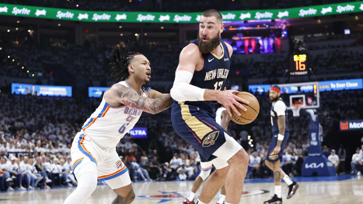 Apr 21, 2024; Oklahoma City, Oklahoma, USA; Oklahoma City Thunder forward Jaylin Williams (6) defends New Orleans Pelicans center Jonas Valanciunas (17) as he moves the ball to the basket during the second quarter of game one of the first round for the 2024 NBA playoffs at Paycom Center