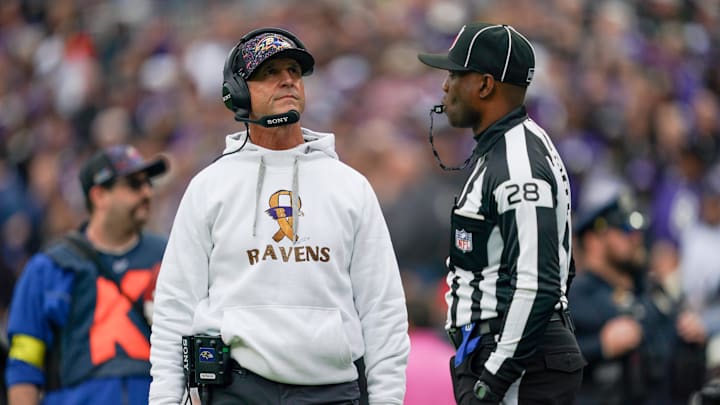 Oct 12, 2025; Baltimore, Maryland, USA; Baltimore Ravens head coach John Harbaugh looks on during the second quarter of the game against the Los Angeles Rams at M&T Bank Stadium. Mandatory Credit: Mitch Stringer-Imagn Images Oct 12, 2025; Baltimore, Maryland, USA; Baltimore Ravens head coach John Harbaugh looks on during the second quarter of the game against the Los Angeles Rams at M&T Bank Stadium. Mandatory Credit: Mitch Stringer-Imagn Images