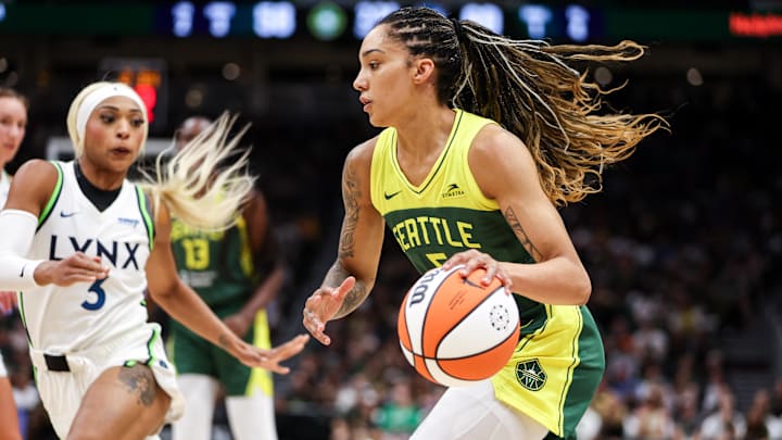 Aug 5, 2025; Seattle, Washington, USA; Seattle Storm guard Gabby Williams (5) controls the ball during the second half against the Minnesota Lynx  at Climate Pledge Arena. 