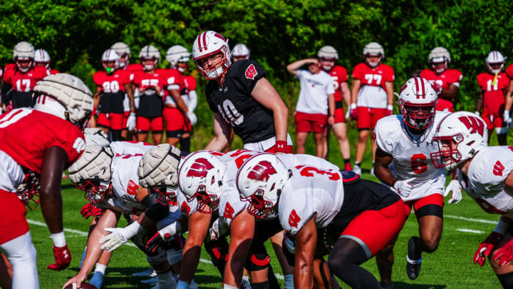 Wisconsin quarterback Tyler Van Dyke (10) calls a play during football practice Wednesday, August 14, 2024 in Madison, Wisconsin.