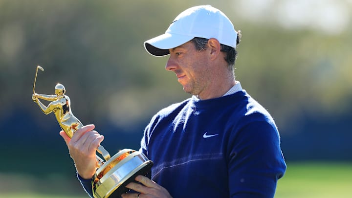 McIlroy and his second Players trophy. McIlroy and his second Players trophy.