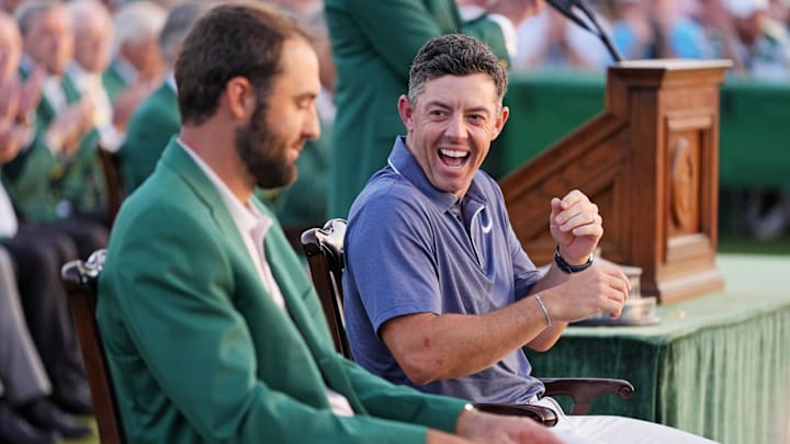 Rory McIlroy (right) is the new betting favorite over Scottie Scheffler. (left) in the betting odds to win the final three majors of the golf season. 