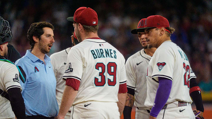Arizona Diamondbacks starting pitcher Corbin Burnes reacts after an injury in the fifth inning against the Washington Nationals.
