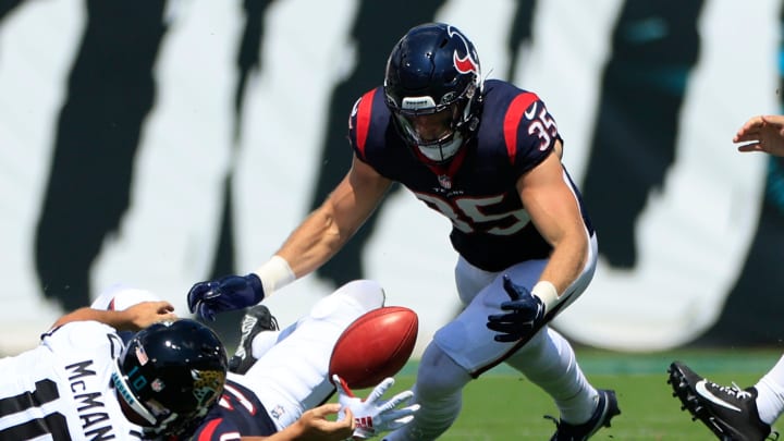 Houston Texans linebacker Jake Hansen (35) comes up with the fumble turnover as Jacksonville Jaguars place kicker Brandon McManus (10) can   t recover a batted Trevor Lawrence pass during the second quarter of an NFL football matchup Sunday, Sept. 24, 2023 at EverBank Stadium in Jacksonville, Fla. The Houston Texans defeated the Jacksonville Jaguars 37-17. [Corey Perrine/Florida Times-Union]