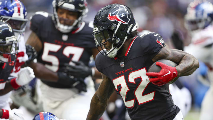 Aug 17, 2024; Houston, Texas, USA; Houston Texans running back Cam Akers (22) runs with the ball during the second quarter against the New York Giants at NRG Stadium. Mandatory Credit: Troy Taormina-USA TODAY Sports