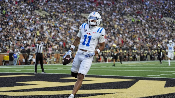 Sep 14, 2024; Winston-Salem, North Carolina, USA;  Mississippi Rebels wide receiver Jordan Watkins (11) runs in for a score against the Wake Forest Demon Deacons during the first half at Allegacy Federal Credit Union Stadium. Mandatory Credit: Jim Dedmon-Imagn Images