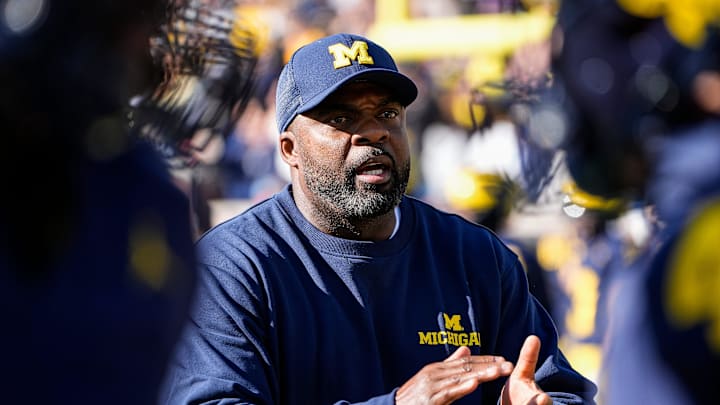 Michigan linebackers coach Brian Jean-Mary watches warm up before the Oregon game at Michigan Stadium in Ann Arbor on Saturday, Nov. 2, 2024.