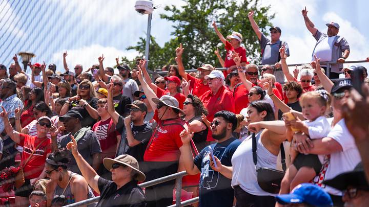 Texas Tech fans cheer during a welcome back event for the Red Raider softball team at Rocky Johnson Field in Lubbock, Texas, on Friday, June 7, 2025.