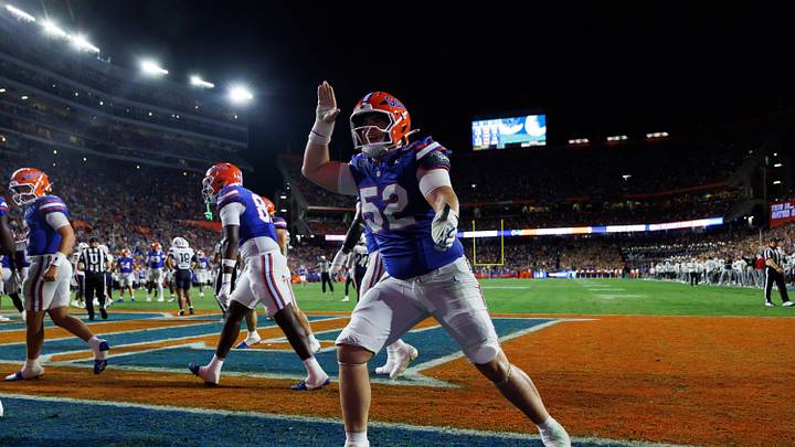 Sep 5, 2026; Gainesville, Florida, USA;  Florida Gators offensive lineman Harrison Moore (52) gestures after a touchdown against the Florida Atlantic Owls during the first half at Ben Hill Griffin Stadium.  Mandatory Credit: Matt Pendleton-Imagn Images