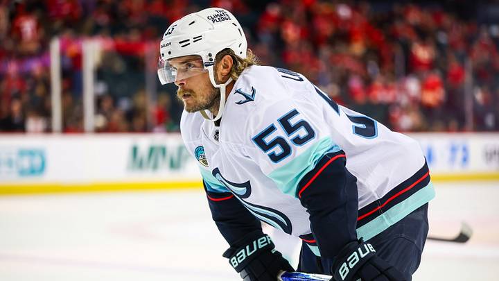 Oct 1, 2026; Calgary, Alberta, CAN; Seattle Kraken defenseman Ryan Lindgren (55) during the face off against the Calgary Flames during the third period at Scotiabank Saddledome. Mandatory Credit: Sergei Belski-Imagn Images
