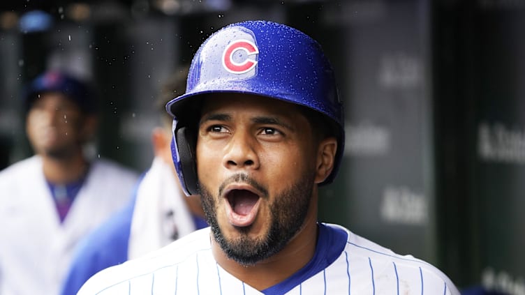 Aug 5, 2023; Chicago, Illinois, USA; Chicago Cubs third baseman Jeimer Candelario (9) is greeted