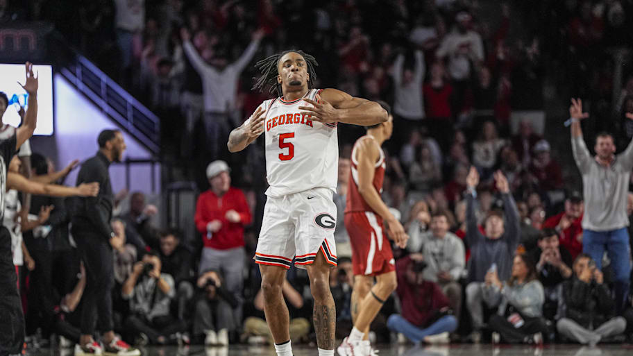 Georgia Bulldogs guard Jeremiah Wilkinson reacts after making a three point shot against the Arkansas Razorbacks.