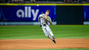 May 24, 2024; Charlotte, NC, USA; Wake Forest infielder Marek Houston (7) throws home for an out against the North Carolina Tar Heels in the eleventh inning during the ACC Baseball Tournament at Truist Field. Mandatory Credit: Scott Kinser-Imagn Images