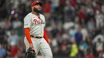 Aug 20, 2024; Cumberland, Georgia, USA; Philadelphia Phillies relief pitcher Jose Alvarado (46) reacts after walking in a run and being removed from the game against the Atlanta Braves during the ninth inning at Truist Park.