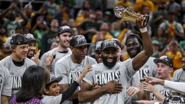 The Celtics celebrate their win against the Indiana Pacers.