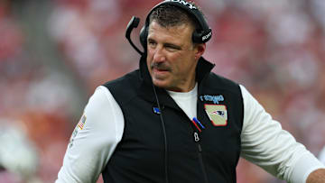 Nov 9, 2025; Tampa, Florida, USA; New England Patriots head coach Mike Vrabel walks downfield during the third quarter against the Tampa Bay Buccaneers at Raymond James Stadium.