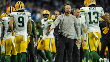 Green Bay Packers head coach Matt LaFleur slaps hands with players after the offense scores a touchdown against the Detroit Lions, during the Thursday Night Football at Ford Field in Detroit on Thursday, Dec. 5, 2024.
