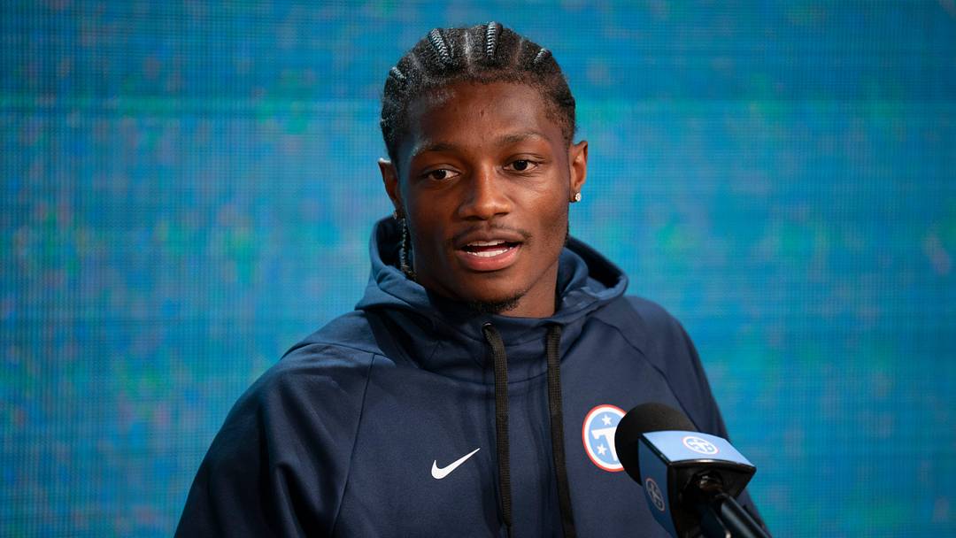 Tennessee Titans first round pick in the 2026 NFL Draft (and 4th overall) wide receiver Carnell Tate (14) speaks to the media after the Titans Rookie Camp Day 1 at Vanderbilt Health Football Center in Nashville, Tenn., Friday, May 1, 2026.