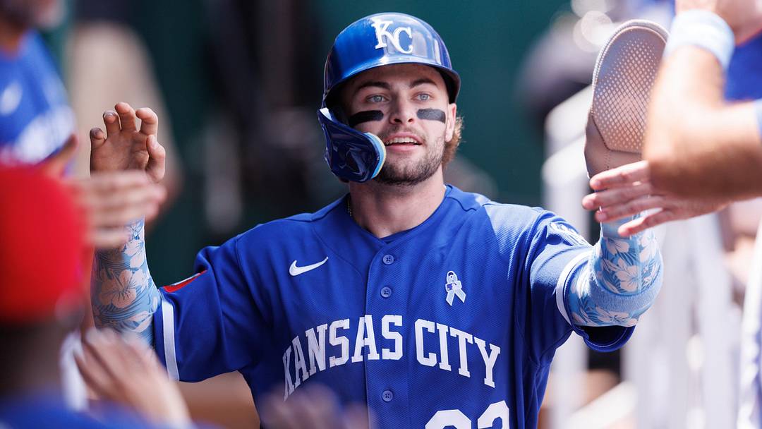 Jun 21, 2026; Kansas City, Missouri, USA; Kansas City Royals catcher Carter Jensen (22) celebrates in the dugout after scoring during the fourth inning against the St. Louis Cardinals at Kauffman Stadium. Mandatory Credit: William Purnell-Imagn Images