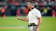 Nov 8, 2025; Miami Gardens, Florida, USA; Miami Hurricanes head coach Mario Cristobal gives his team instructions against the Syracuse Orange during the third quarter at Hard Rock Stadium. Mandatory Credit: Jeff Romance-Imagn Images
