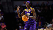 Jan 19, 2025; Gainesville, Florida, USA; LSU Tigers guard Flau'Jae Johnson (4) gestures against the Florida Gators during the first half at Exactech Arena at the Stephen C. O'Connell Center. Mandatory Credit: Matt Pendleton-Imagn Images