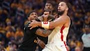 May 2, 2025; San Francisco, California, USA; Golden State Warriors guard Gary Payton II (0) and Houston Rockets guard Dillon Brooks (9) battle for position in the second quarter of game six of the first round for the 2025 NBA Playoffs at Chase Center. Mandatory Credit: Cary Edmondson-Imagn Images