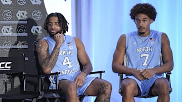 Oct 10, 2024; Charlotte, NC, USA;  North Carolina player R.J. Davis and Seth Trimble at The Hilton Charlotte Uptown. Mandatory Credit: Jim Dedmon-Imagn Images