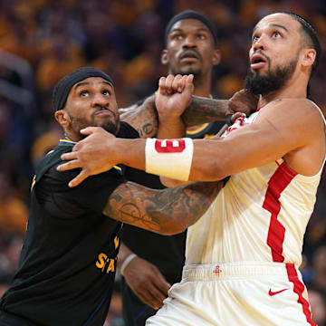 May 2, 2025; San Francisco, California, USA; Golden State Warriors guard Gary Payton II (0) and Houston Rockets guard Dillon Brooks (9) battle for position in the second quarter of game six of the first round for the 2025 NBA Playoffs at Chase Center. Mandatory Credit: Cary Edmondson-Imagn Images