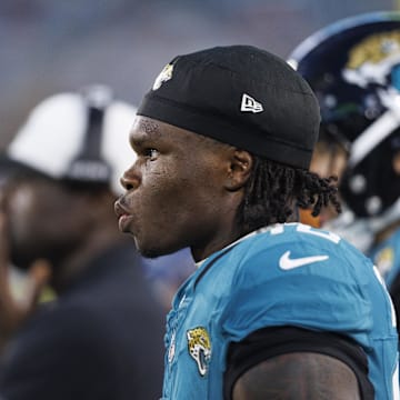Aug 9, 2025; Jacksonville, Florida, USA; Jacksonville Jaguars wide receiver Travis Hunter (12) watches the second quarter against the Pittsburgh Steelers at EverBank Stadium. Mandatory Credit: Morgan Tencza-Imagn Images