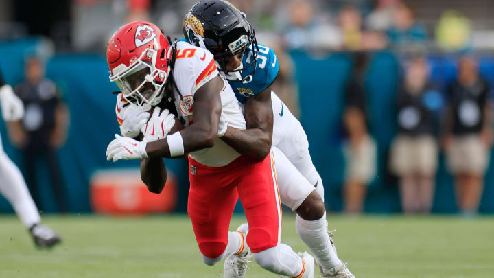 Jacksonville Jaguars cornerback Montaric Brown (30) tackles Kansas City Chiefs wide receiver Hollywood Brown (5) during the first quarter of a preseason NFL football game Saturday, Aug. 10, 2024 at EverBank Stadium in Jacksonville, Fla. [Corey Perrine/Florida Times-Union]