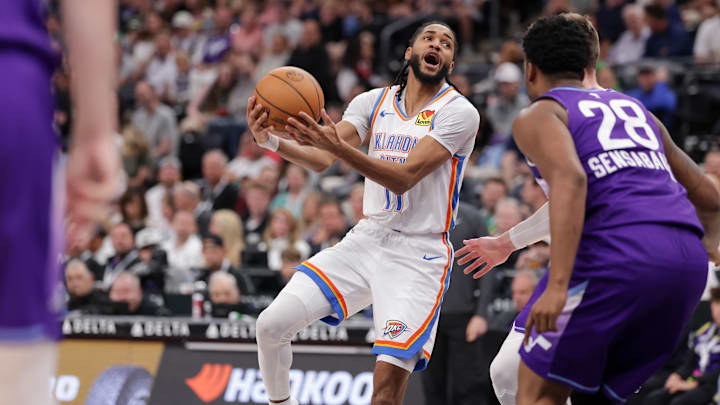 Apr 11, 2025; Salt Lake City, Utah, USA;  Oklahoma City Thunder guard Isaiah Joe (11) tries to past the ball against the Utah Jazz during the second quarter at Delta Center. Mandatory Credit: Chris Nicoll-Imagn Images