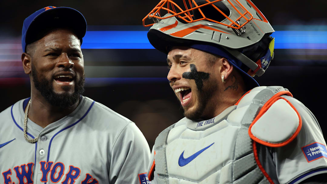 Jun 18, 2024; Arlington, Texas, USA; New York Mets pitcher Luis Severino (40) (L) and catcher Francisco Alvarez (4) walk off the field in the fifth inning against the Texas Rangers at Globe Life Field. Mandatory Credit: Tim Heitman-Imagn Images