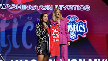Apr 14, 2025; New York, New York, USA; Georgia Amoore poses with WNBA commissioner Cathy Engelbert after being selected with the number six overall pick to the Washington Mystics in the 2025 WNBA Draft at The Shed at Hudson Yards. Mandatory Credit: Vincent Carchietta-Imagn Images 