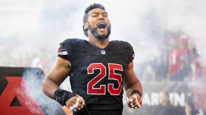 Nov 26, 2023; Glendale, Arizona, USA; Arizona Cardinals linebacker Zaven Collins (25) reacts against the Los Angeles Rams at State Farm Stadium. Mandatory Credit: Mark J. Rebilas-USA TODAY Sports