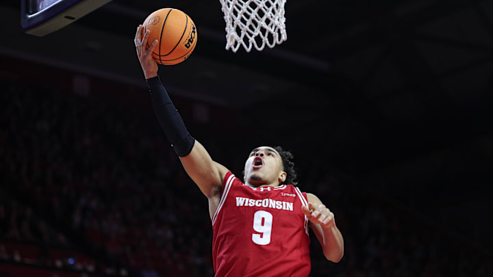 Jan 6, 2025; Piscataway, New Jersey, USA; Wisconsin Badgers guard John Tonje (9) goes to the basket during the first half against the Rutgers Scarlet Knights at Jersey Mike's Arena. Mandatory Credit: Vincent Carchietta-Imagn Images