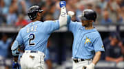 Tampa Bay's Yandy Diaz (left) celebrates with Rays second baseman Brandon Lowe (after hitting a home run.  