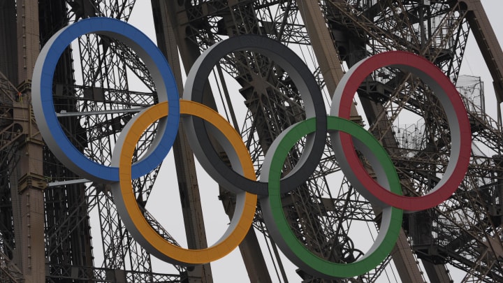 Jul 26, 2024; Paris, FRANCE; View of the Olympic rings on the Eiffel Tower before the Opening Ceremony for the Paris 2024 Olympic Summer Games along the Seine River.