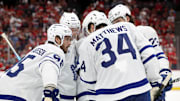 May 11, 2025; Sunrise, Florida, USA; Toronto Maple Leafs center Auston Matthews (34) talks with defenseman Oliver Ekman-Larsson (95), defenseman Morgan Rielly (44), left wing Matthew Knies (23) and right wing Mitch Marner (16) against the Florida Panthers during the third period in game four of the second round of the 2025 Stanley Cup Playoffs at Amerant Bank Arena. Mandatory Credit: Kim Klement Neitzel-Imagn Images